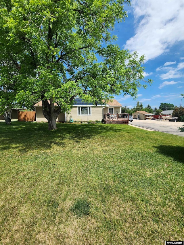 828 Fort St, Buffalo, WY 82834 - view of yard featuring a deck