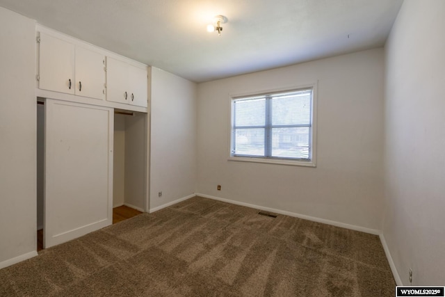 2841 E 4th St, Casper, WY 82609 - unfurnished bedroom with carpet floors and a closet