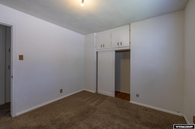 2841 E 4th St, Casper, WY 82609 - unfurnished bedroom with carpet flooring and a closet