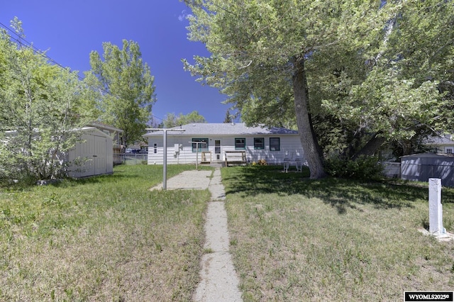 2841 E 4th St, Casper, WY 82609 - view of front of house with a shed and a patio area