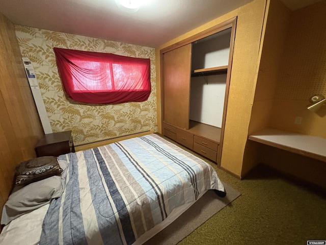 1501 N Federal Blvd, Riverton, WY 82501 - bedroom featuring a closet, wallpapered walls, and carpet