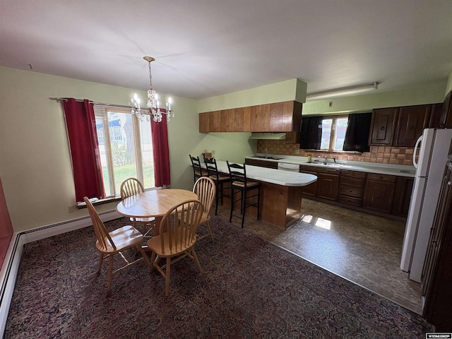 1501 N Federal Blvd, Riverton, WY 82501 - dining area with a chandelier