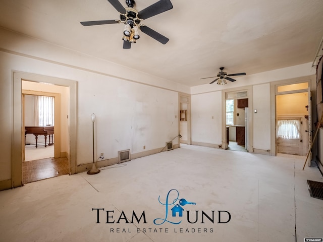 719 E 4th St, Casper, WY 82601 - empty room with ceiling fan and healthy amount of natural light