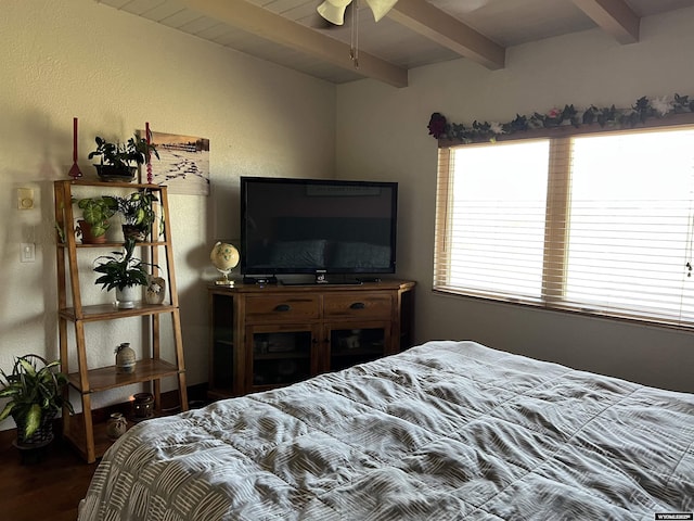 4359 Almy Rd Unit 107, Evanston, WY 82930 - bedroom featuring beam ceiling and wood finished floors