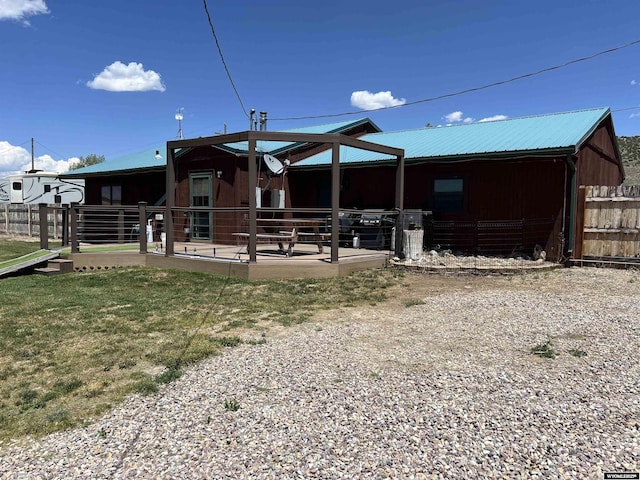 4359 Almy Rd Unit 107, Evanston, WY 82930 - rear view of house featuring a metal roof