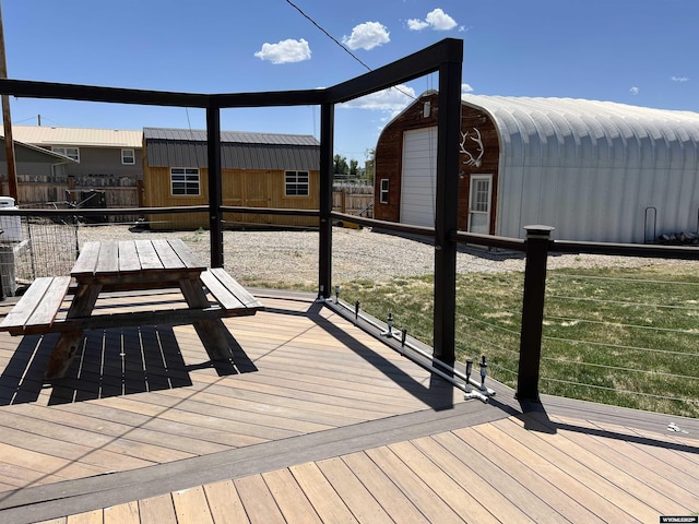 4359 Almy Rd Unit 107, Evanston, WY 82930 - wooden terrace featuring an outbuilding