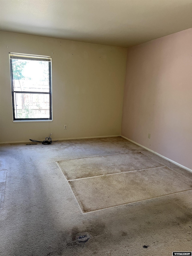 133 Shady Ln, Evanston, WY 82930 - carpeted empty room featuring baseboards