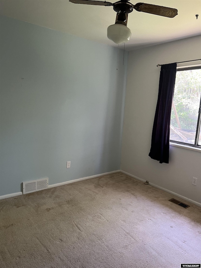 133 Shady Ln, Evanston, WY 82930 - spare room with carpet flooring and ceiling fan