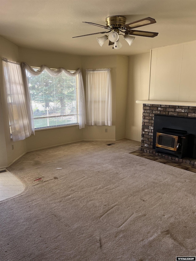 133 Shady Ln, Evanston, WY 82930 - unfurnished living room featuring ceiling fan and carpet