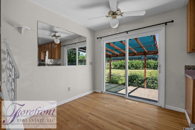2240 E 17th St, Casper, WY 82609 - unfurnished room featuring ceiling fan and light wood finished floors