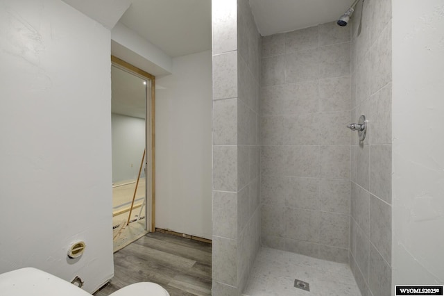 2203 W 42nd St, Casper, WY 82604 - bathroom featuring a shower stall and wood finished floors
