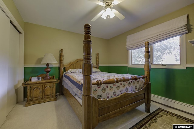 2203 W 42nd St, Casper, WY 82604 - carpeted bedroom featuring a baseboard heating unit, ceiling fan, and a closet