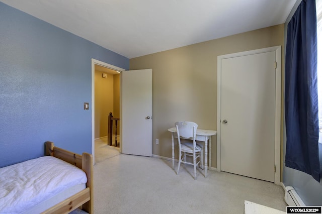 2203 W 42nd St, Casper, WY 82604 - bedroom featuring light colored carpet and baseboard heating