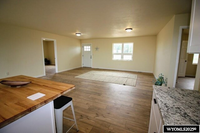 380 S-A Rd, Morrill, NE 69358 - entrance foyer featuring healthy amount of natural light and wood finished floors