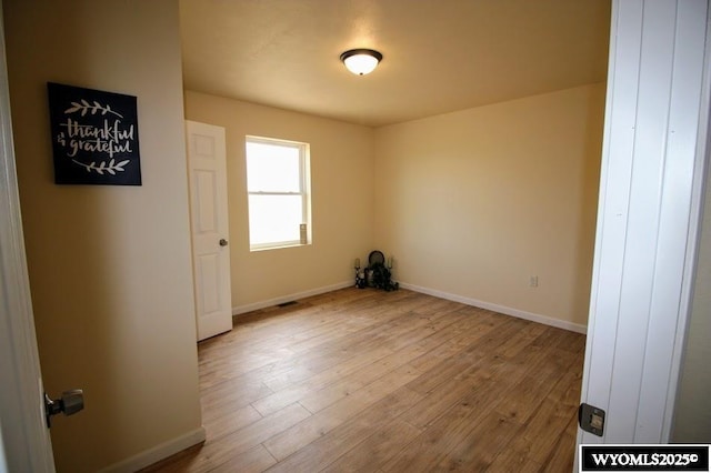 380 S-A Rd, Morrill, NE 69358 - empty room with wood finished floors and baseboards