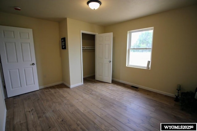 380 S-A Rd, Morrill, NE 69358 - unfurnished bedroom featuring wood finished floors and a closet
