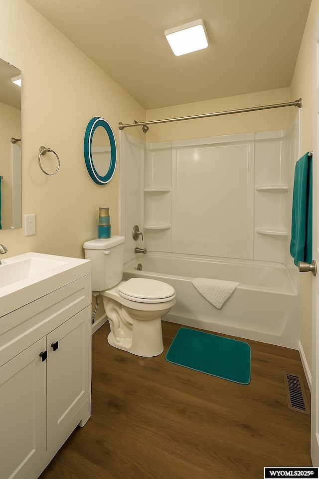 380 S-A Rd, Morrill, NE 69358 - bathroom with vanity, bathing tub / shower combination, and wood finished floors
