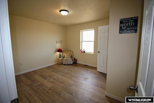 380 S-A Rd, Morrill, NE 69358 - empty room featuring wood finished floors and baseboards