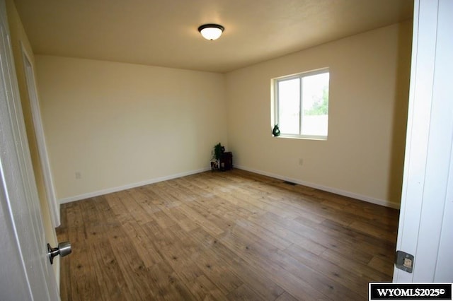 380 S-A Rd, Morrill, NE 69358 - unfurnished room featuring wood finished floors and baseboards