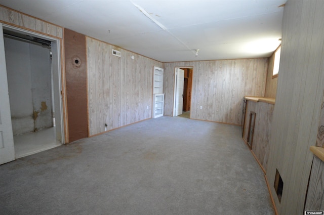 2142 W C St, Torrington, WY 82240 - finished below grade area featuring wooden walls and carpet flooring