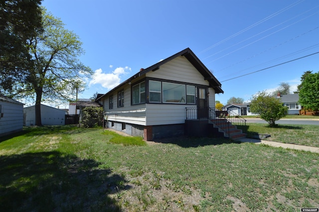 2142 W C St, Torrington, WY 82240 - view of front of house with a front yard