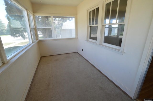 2142 W C St, Torrington, WY 82240 - unfurnished sunroom with carpet flooring and baseboards