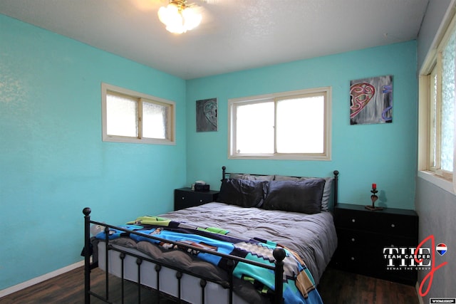 809 N Durbin, Casper, WY 82601 - bedroom featuring dark wood finished floors and multiple windows