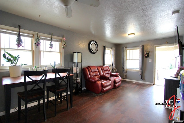 809 N Durbin, Casper, WY 82601 - living area featuring a textured ceiling, dark wood finished floors, and a ceiling fan