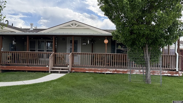 2108 Energy, Rawlins, WY 82301 - view of front of property with a front yard