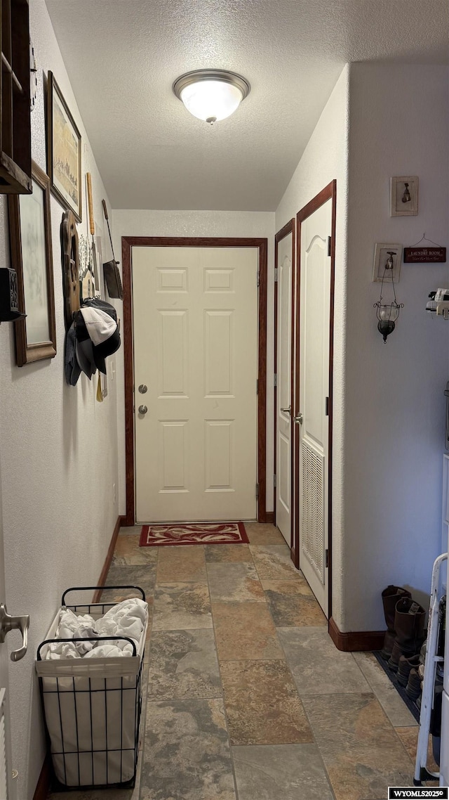 2108 Energy, Rawlins, WY 82301 - hall with a textured ceiling and stone finish flooring