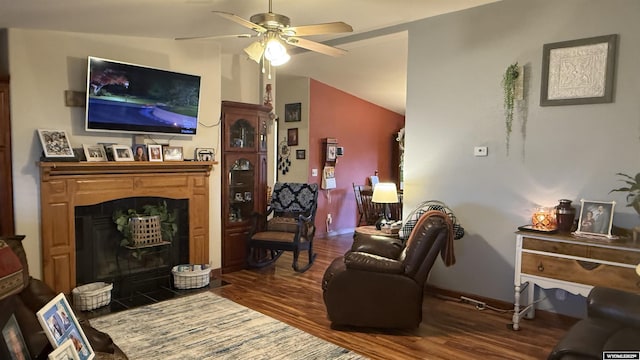 2108 Energy, Rawlins, WY 82301 - living room featuring a fireplace with flush hearth, wood finished floors, ceiling fan, and lofted ceiling