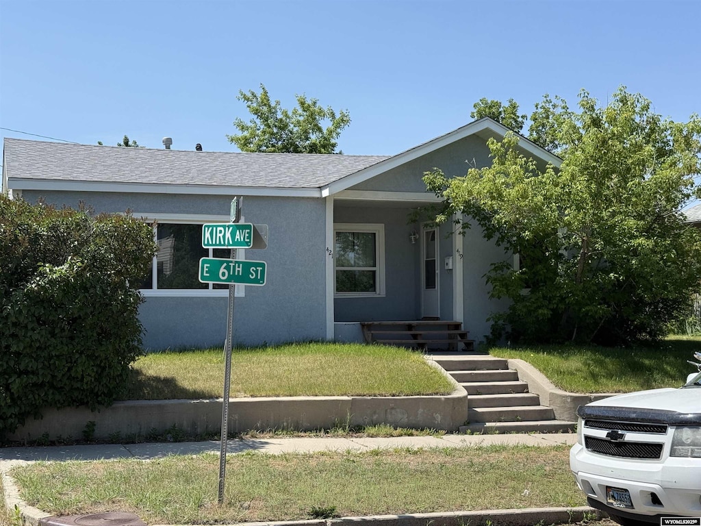 419 E 6th St, Casper, WY 82601 - view of front of home featuring stucco siding