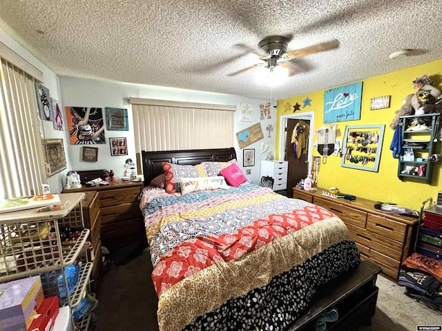 327 S Iowa Ave, Guernsey, WY 82214 - bedroom with a textured ceiling, carpet, and ceiling fan