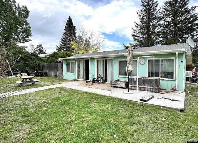 327 S Iowa Ave, Guernsey, WY 82214 - back of property with a patio area