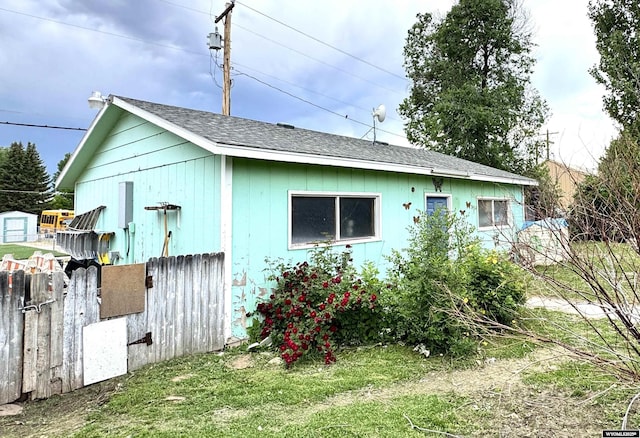 327 S Iowa Ave, Guernsey, WY 82214 - view of property exterior with roof with shingles