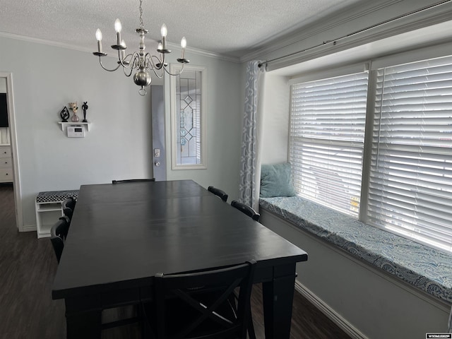 703 Randolph St, Rock Springs, WY 82901 - dining room with a chandelier, dark wood finished floors, ornamental molding, and a textured ceiling
