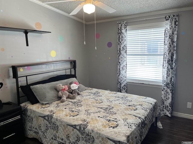 703 Randolph St, Rock Springs, WY 82901 - bedroom featuring wood finished floors, crown molding, multiple windows, a textured ceiling, and a ceiling fan
