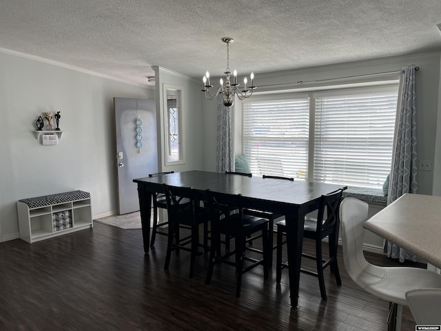 703 Randolph St, Rock Springs, WY 82901 - dining area featuring crown molding, a chandelier, wood finished floors, and a textured ceiling