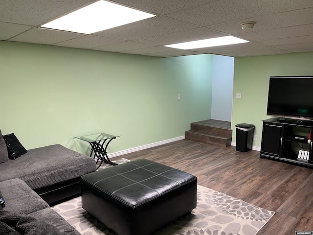 703 Randolph St, Rock Springs, WY 82901 - living room featuring wood finished floors and a paneled ceiling
