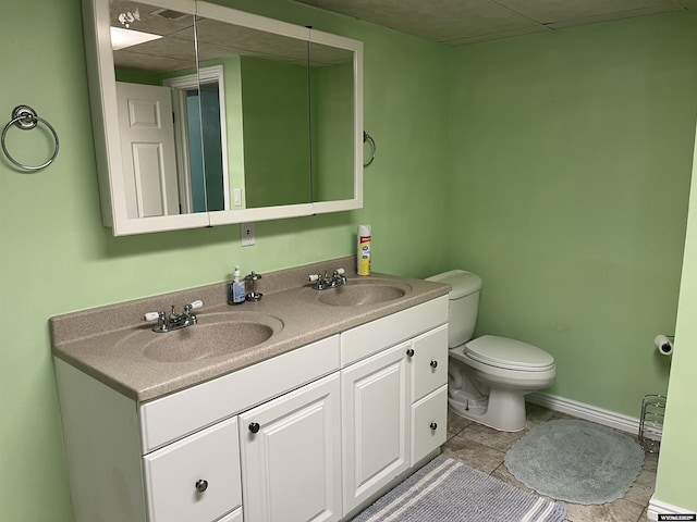 703 Randolph St, Rock Springs, WY 82901 - bathroom featuring double vanity and tile patterned floors