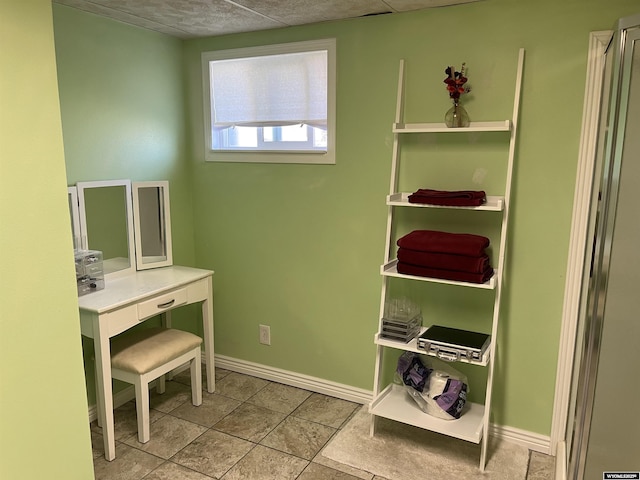 703 Randolph St, Rock Springs, WY 82901 - tiled office featuring baseboards