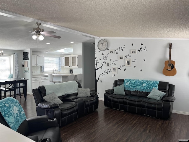 703 Randolph St, Rock Springs, WY 82901 - living room featuring a textured ceiling, ceiling fan, dark wood-style floors, and recessed lighting
