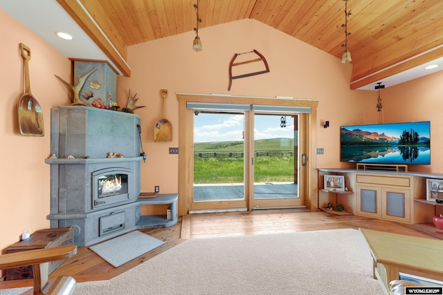 966 Mill Creek Rd, Evanston, WY 82930 - living area with a wood stove, wooden ceiling, wood finished floors, high vaulted ceiling, and recessed lighting