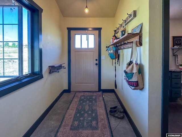 18 Lewis Dr, Lander, WY 82520 - doorway to outside featuring baseboards