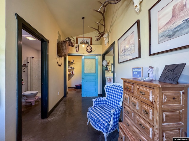 18 Lewis Dr, Lander, WY 82520 - living area featuring finished concrete floors and vaulted ceiling