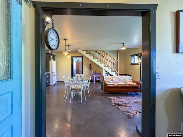 18 Lewis Dr, Lander, WY 82520 - dining space with stairs and concrete floors