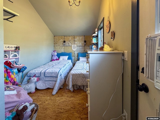 18 Lewis Dr, Lander, WY 82520 - bedroom with vaulted ceiling and a chandelier