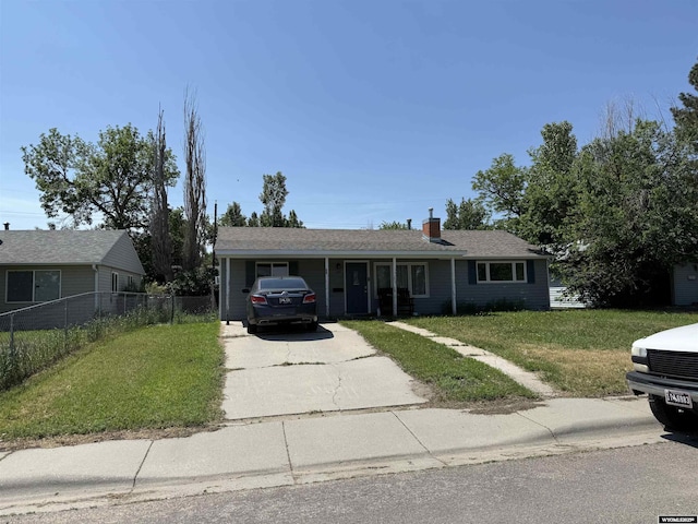 389 N Minnesota, Casper, WY 82609 - ranch-style house featuring driveway and a chimney