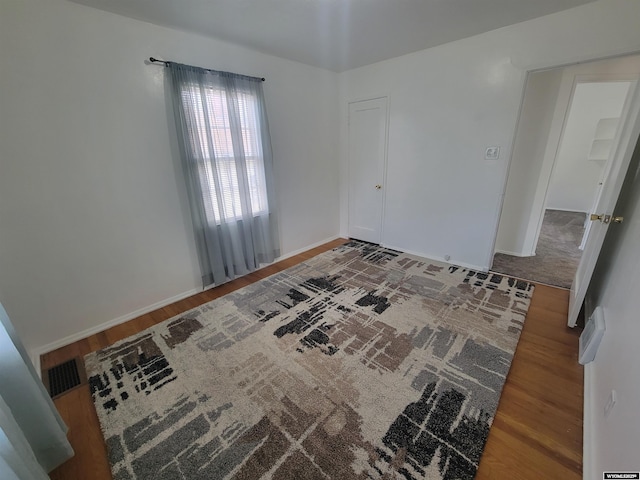 1031 Mckinley Ave, Rock Springs, WY 82901 - empty room featuring wood finished floors and baseboards