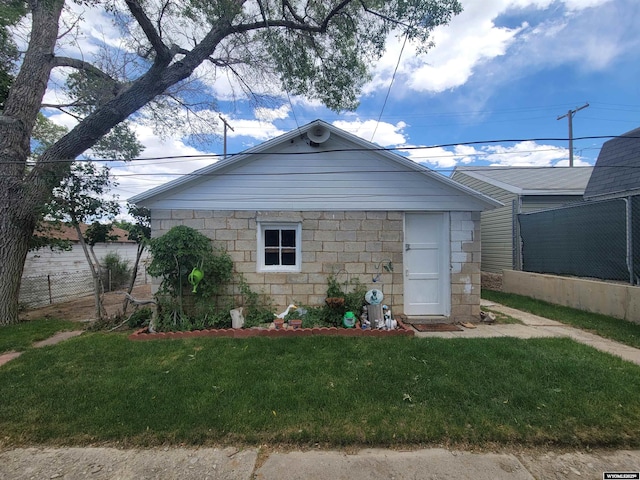 1031 Mckinley Ave, Rock Springs, WY 82901 - view of property exterior featuring stone siding